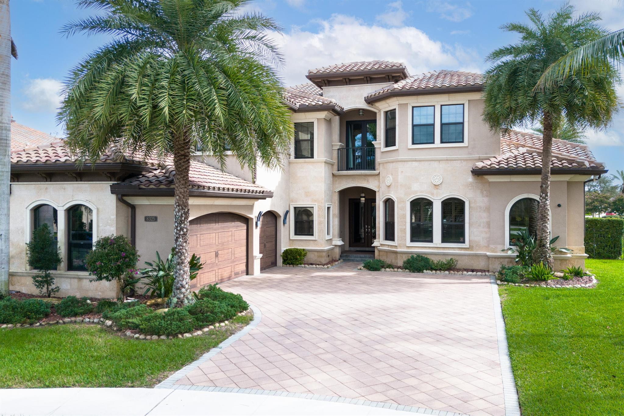 This stunning home features a breathtaking pool and spa, offering serene lake views. The corner lot on a quiet rotunda provides extra privacy and minimal traffic, making it a perfect oasis for relaxation or entertaining. Step inside to discover upgraded marble flooring that adds an air of elegance throughout the home. The kitchen features high-end appliances including a WOLF range and SUB-ZERO refrigerator. The home is fitted with a whole-house entertainment system that creates an ideal setting for hosting family and friends. The home is zoned with excellent public schools, close to shopping and dining, and the community offers a resort lifestyle with a pool, clubhouse, fitness center, tennis and pickleball courts, gaming room, card room, splash pad, and more!