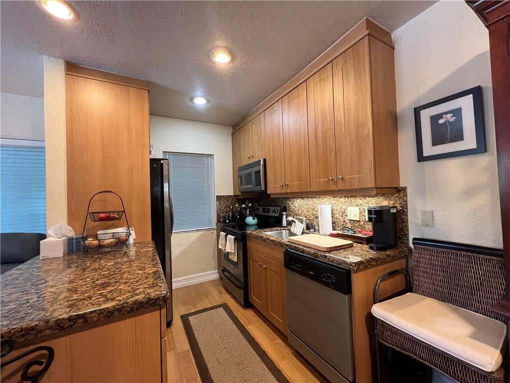 Photo of 1423 HOLLY HEIGHTS Drive #7, Fort Lauderdale, FL 33304 (MLS # B26062211)