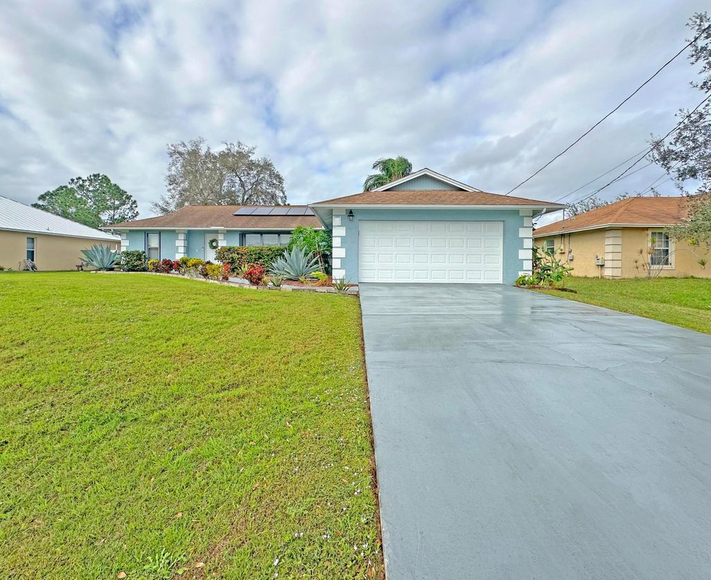 Photo of 3528 SW Zullo Street, Port Saint Lucie, FL 34953 (MLS # R11068282)