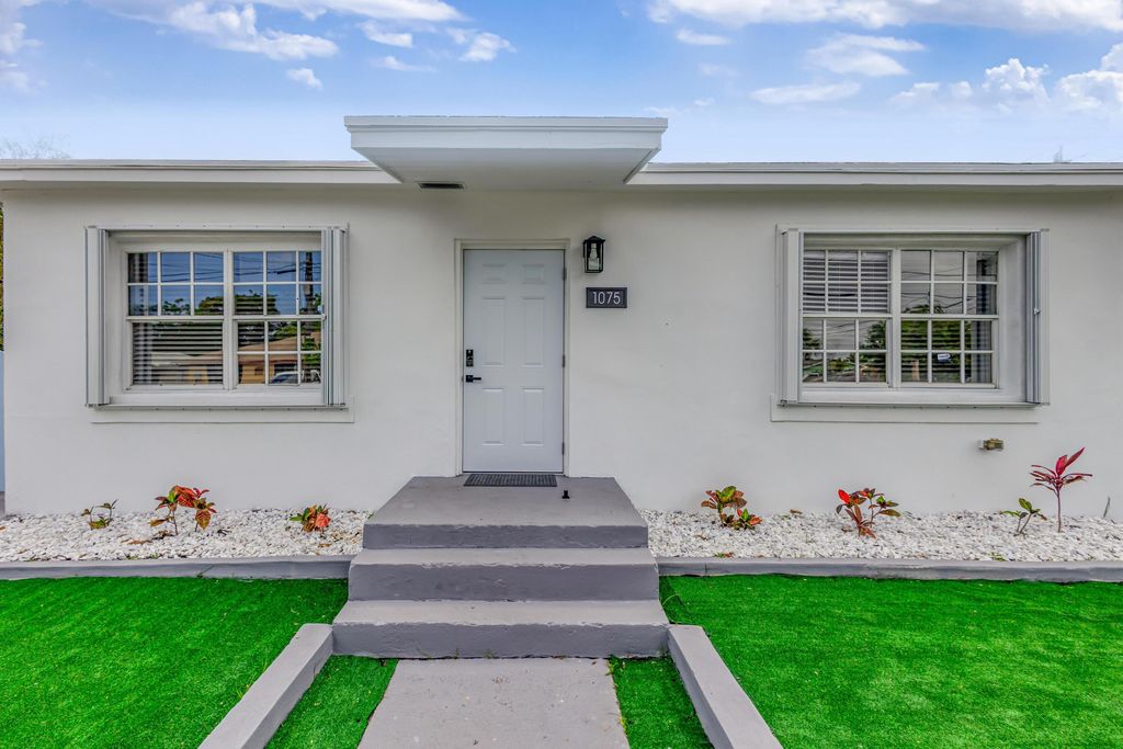 Photo of 1075 W 30th Street, Riviera Beach, FL 33404 (MLS # R11159830)