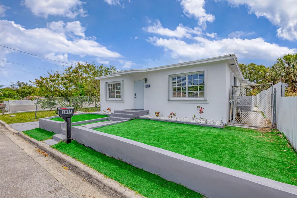 Photo of 1075 W 30th Street, Riviera Beach, FL 33404 (MLS # R11159830)