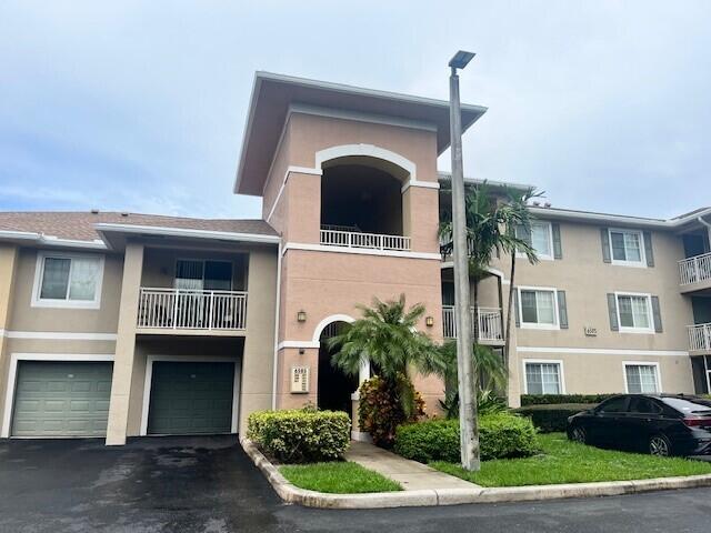 Photo of 6505 Emerald Dunes Drive #108, West Palm Beach, FL 33411 (MLS # R11016678)
