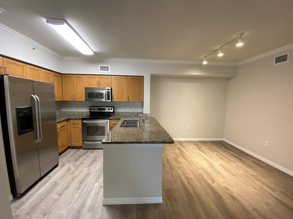 Photo of 6505 Emerald Dunes Drive #108, West Palm Beach, FL 33411 (MLS # R11016678)