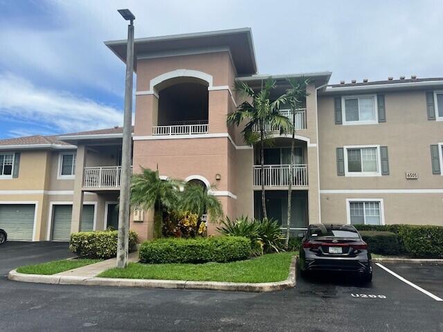Photo of 6505 Emerald Dunes Drive #108, West Palm Beach, FL 33411 (MLS # R11016678)