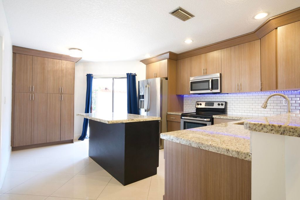 Photo of 8989 W Sunrise Boulevard, Plantation, FL 33322 (MLS # B26008719)