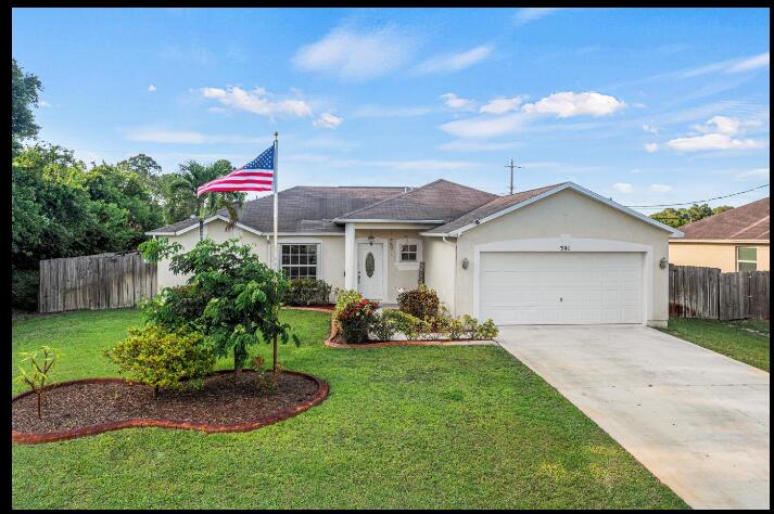 Photo of 391 SW Lacroix Avenue, Port Saint Lucie, FL 34953 (MLS # R10991827)