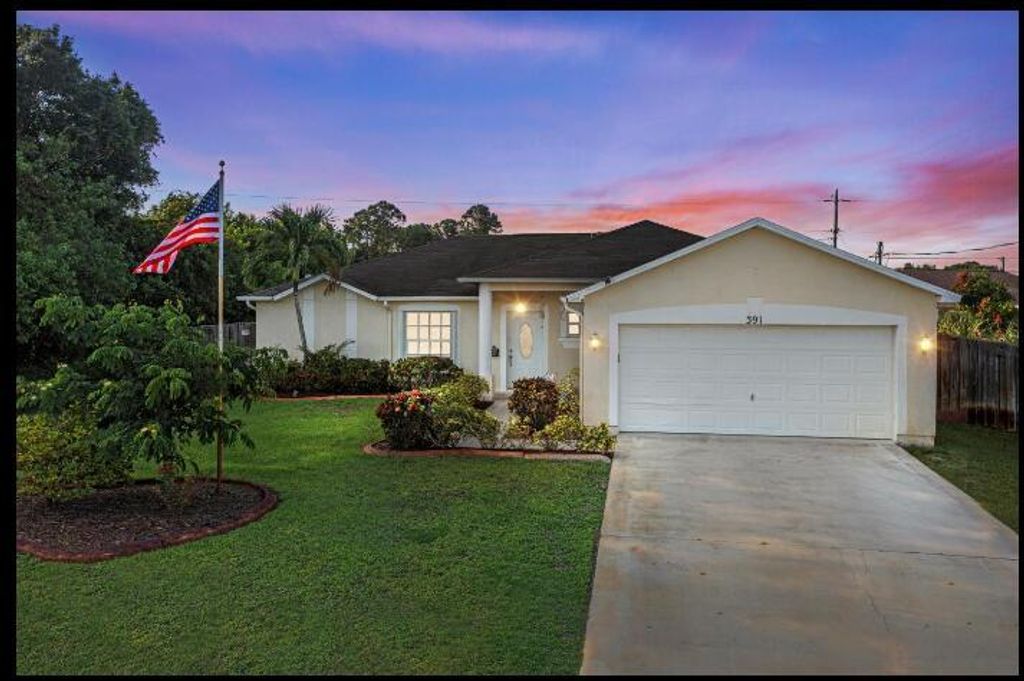 Photo of 391 SW Lacroix Avenue, Port Saint Lucie, FL 34953 (MLS # R10991827)