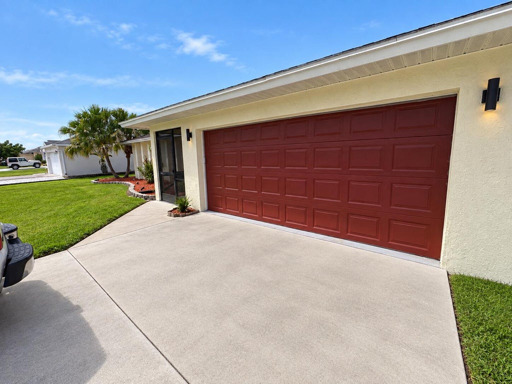 Photo of 991 SE Brookedge Avenue, Port Saint Lucie, FL 34983 (MLS # B26070734)