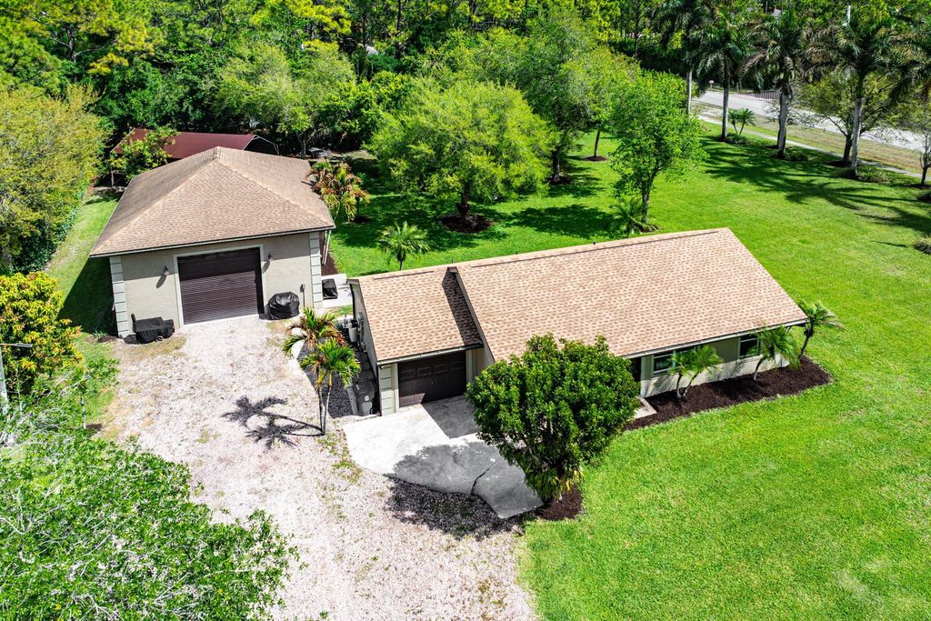 Photo of 17517 60th Lane N, Loxahatchee, FL 33470 (MLS # B26007897)