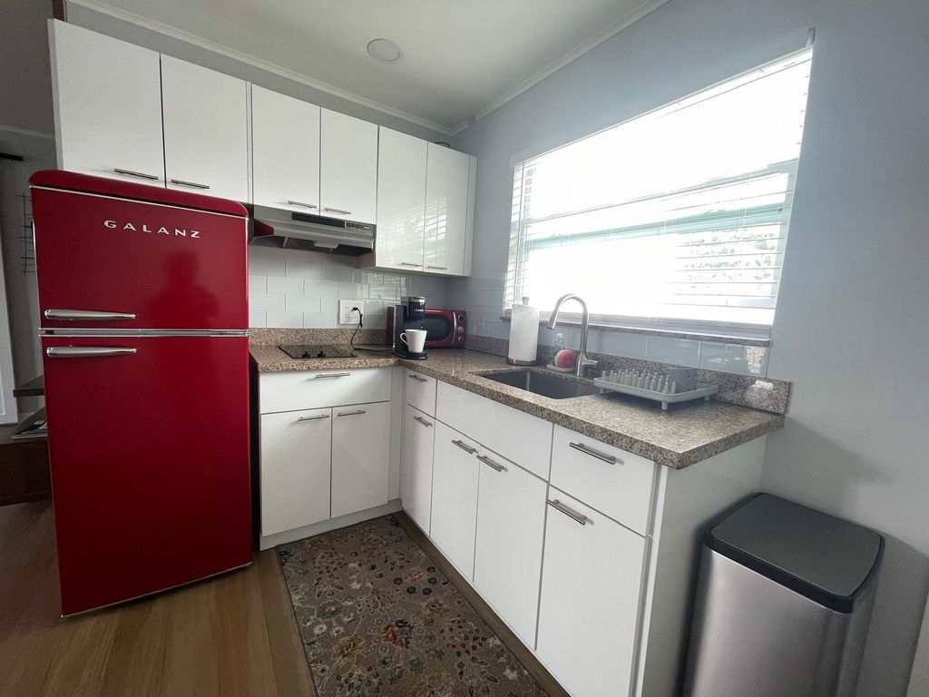 Photo of 203 Seacrest Lane #A, Delray Beach, FL 33444 (MLS # B26020370)
