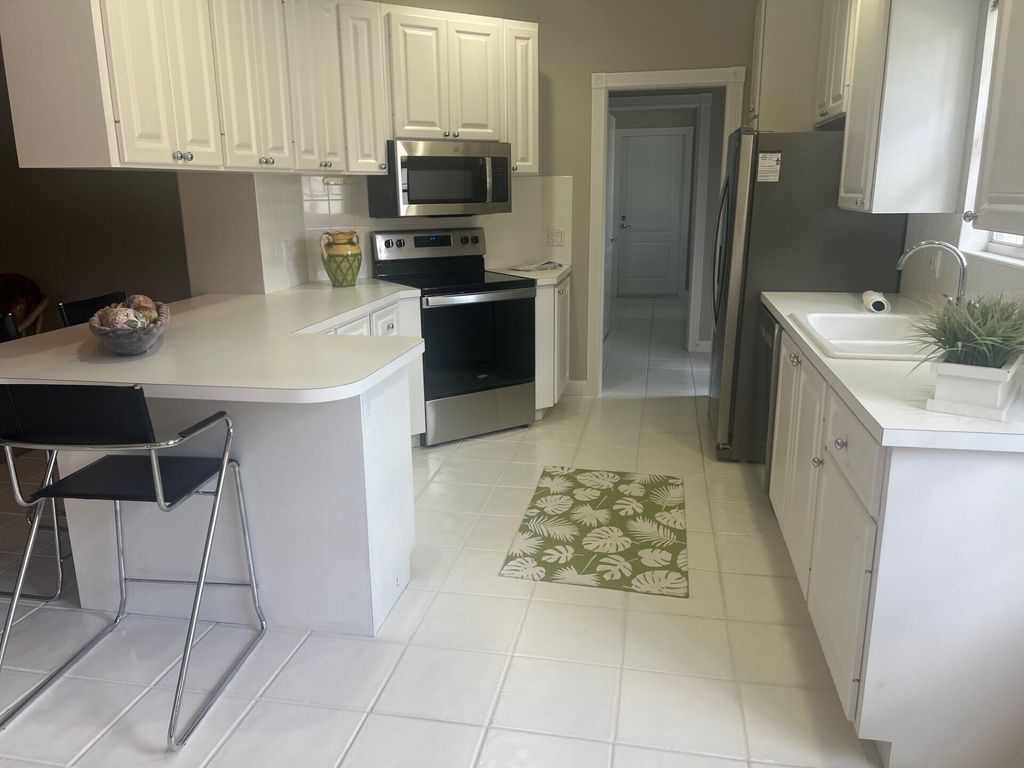 Photo of 7080 Gila Lane, West Palm Beach, FL 33411 (MLS # R10993642)