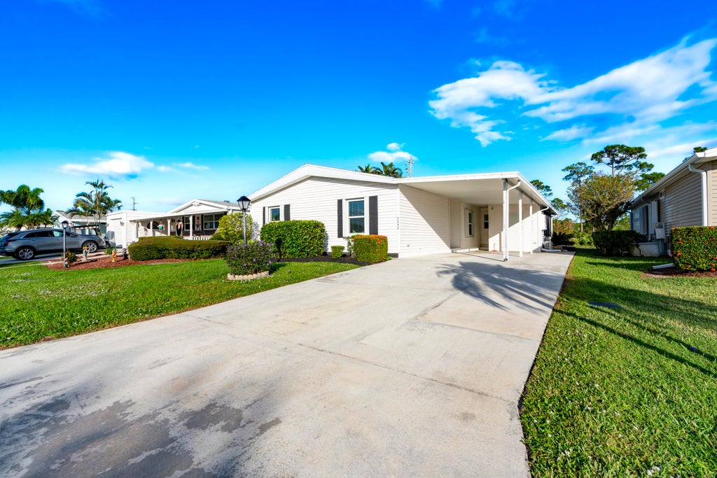 Photo of 8404 Gallberry Circle, Port Saint Lucie, FL 34952 (MLS # R11037146)