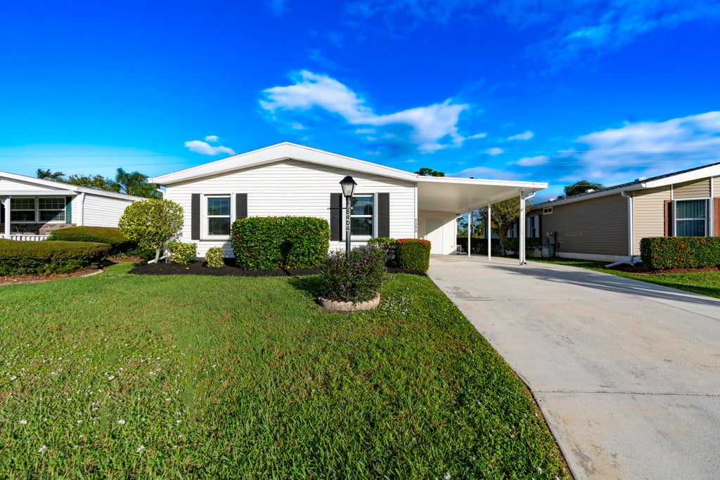 Photo of 8404 Gallberry Circle, Port Saint Lucie, FL 34952 (MLS # R11037146)