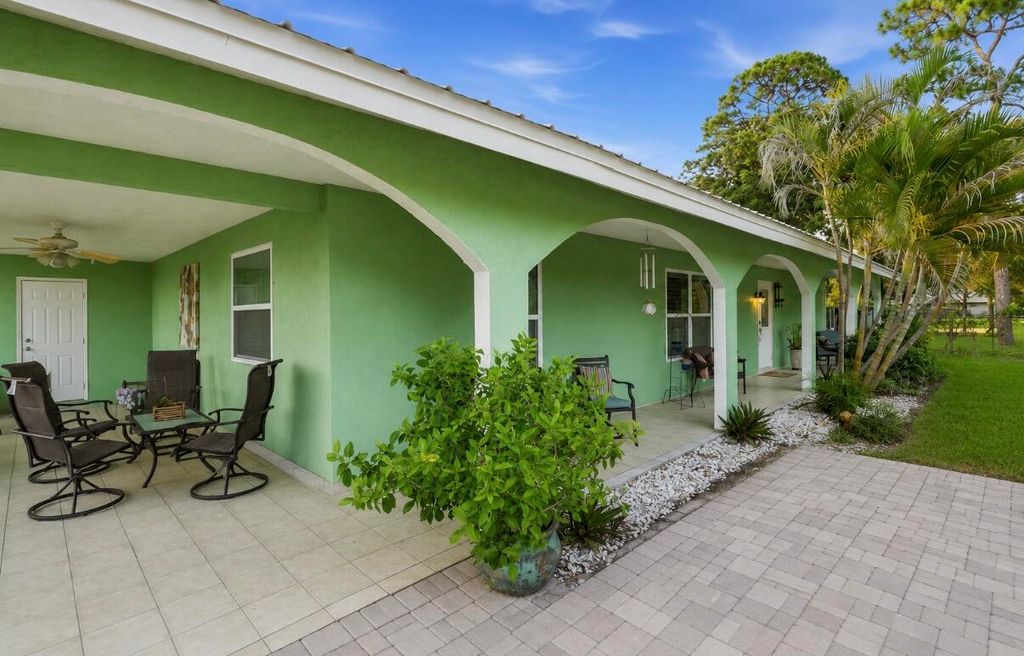 Photo of 309 Hach Lane, West Palm Beach, FL 33415 (MLS # B26030138)