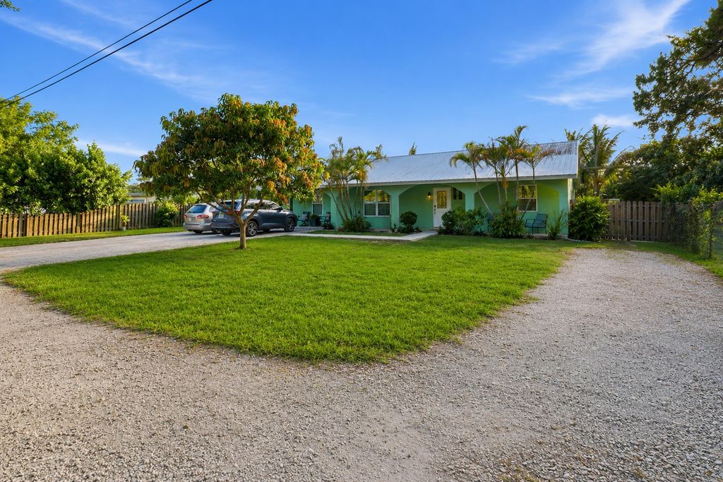 Photo of 309 Hach Lane, West Palm Beach, FL 33415 (MLS # B26030138)