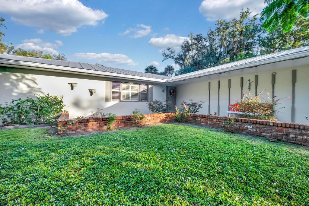 Photo of 3606 Wilderness Drive E, Fort Pierce, FL 34982 (MLS # R11038555)