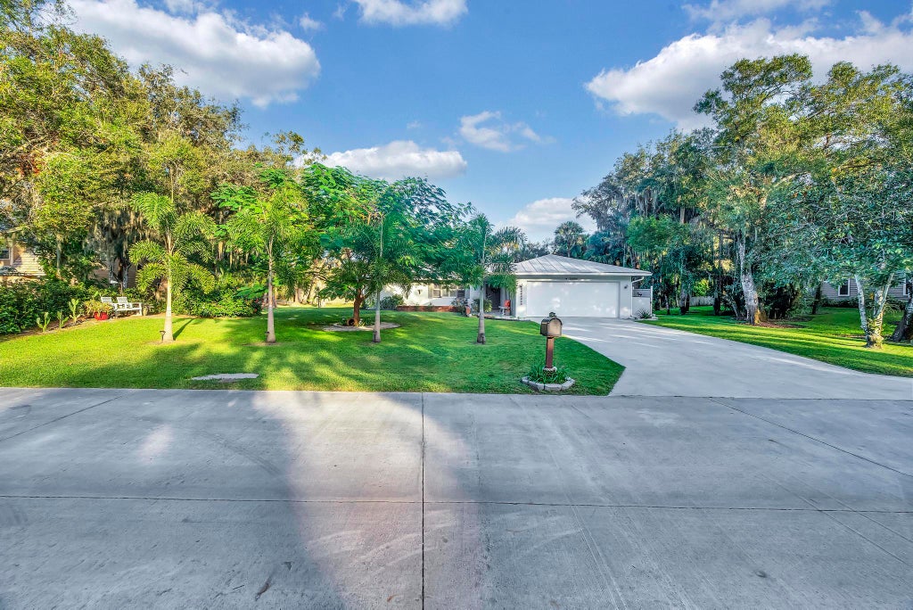 Photo of 3606 Wilderness Drive E, Fort Pierce, FL 34982 (MLS # R11038555)