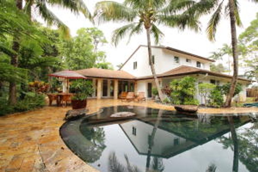 Nestled on an oversized, corner lot at the end of a cul-de-sac in the heart of Delray's prestigious Lake Ida is where you will find this one of a kind 4 bedroom, 3.5 bath, 2 car garage, salt water pool home. Blending modern elegance with contemporary design, this home features: Tons of natural light, IMPACT windows and doors, full house generator, new roof, wood burning fireplace, private gym/home office, custom workshop and/or studio, media room, Custom Poggen Phol kitchen with top of the line stainless steel appliances and marble countertops, covered patio with travertine pavers, lush landscaping, ZEN herb garden and an ultra-private back yard. This well sought after neighborhood is just a quick bike ride/golf cart drive away from the white sand beaches and downtown city life of Delray