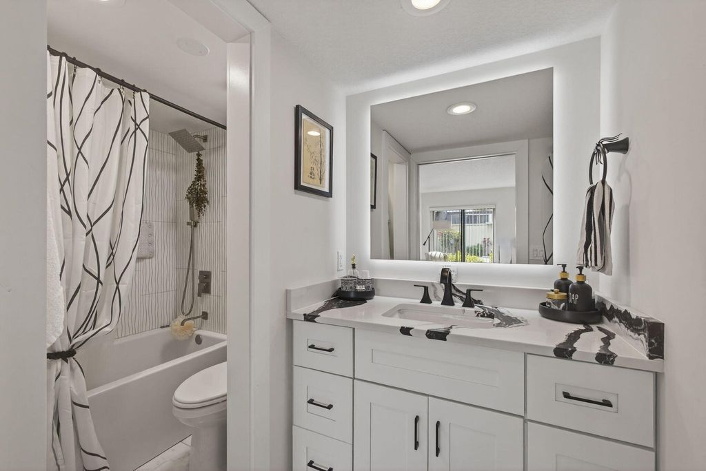 Photo of 2532 S Boundbrook Dr DR S #102, Palm Springs, FL 33406 (MLS # B26026422)