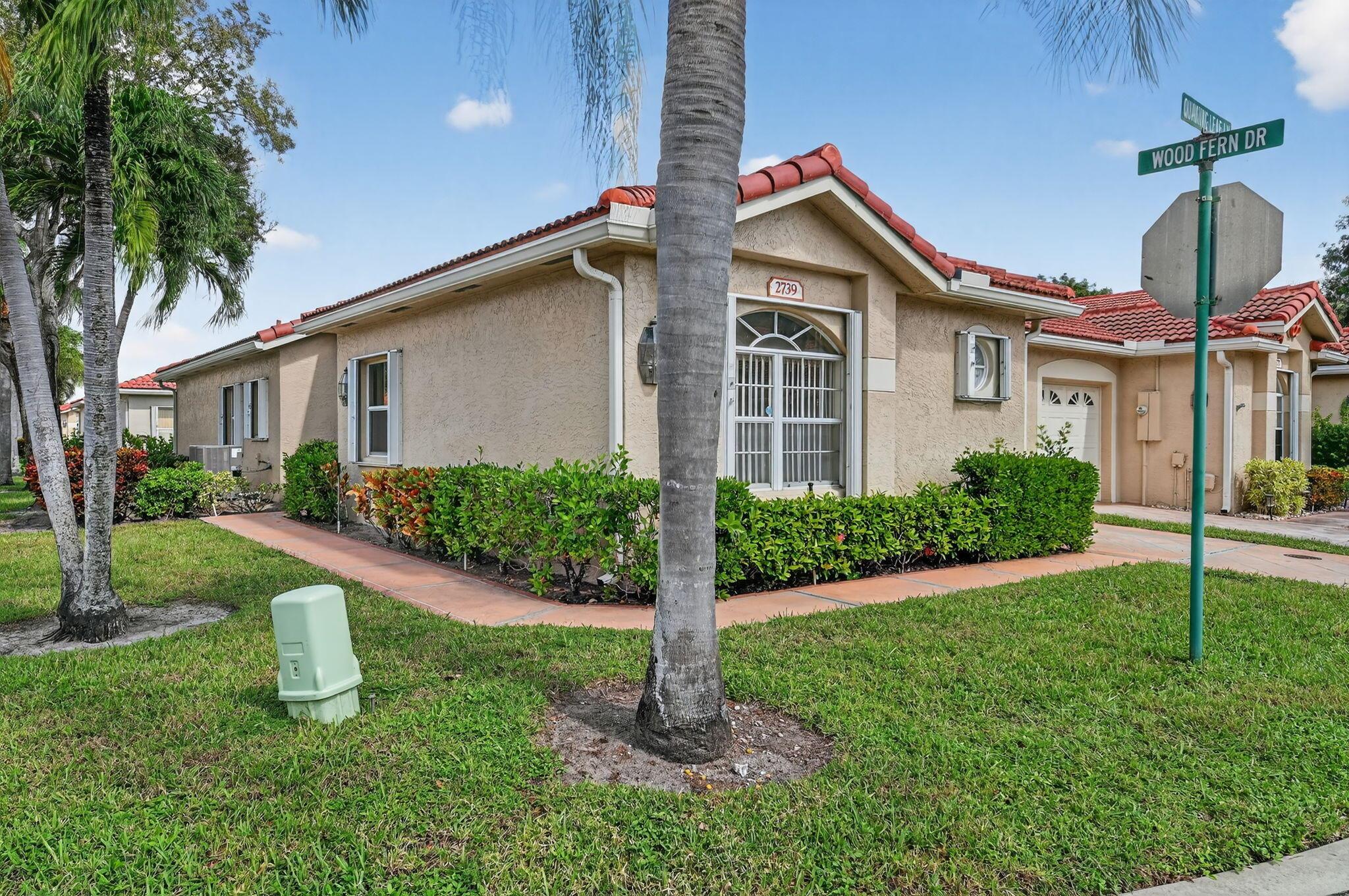 Welcome to this charming 3-bedroom, 2.1-bathroom corner villa nestled in the desirable, all-age, and quiet community of Quail Run. Offering low HOA fees and a relaxed Florida lifestyle. This home features an open, airy floor plan with high ceilings and neutral tile flooring throughout. The spacious living area is perfect for entertaining family and friends, while the air-conditioned 117 SqFt Florida room is the ideal spot for morning coffee or to unwind with a glass of wine after a busy day. A new roof was installed in 2021, and the ongoing assessment for this improvement will be paid in full by the seller at closing. Accordion shutters provide added peace of mind. The primary suite offers double closets for ample storage and convenience. Quail Run is renowned for its beautiful,
