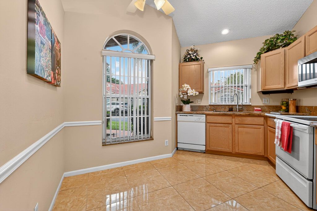 Photo of 2739 Quaking Leaf Lane, Boynton Beach, FL 33436 (MLS # R11135363)