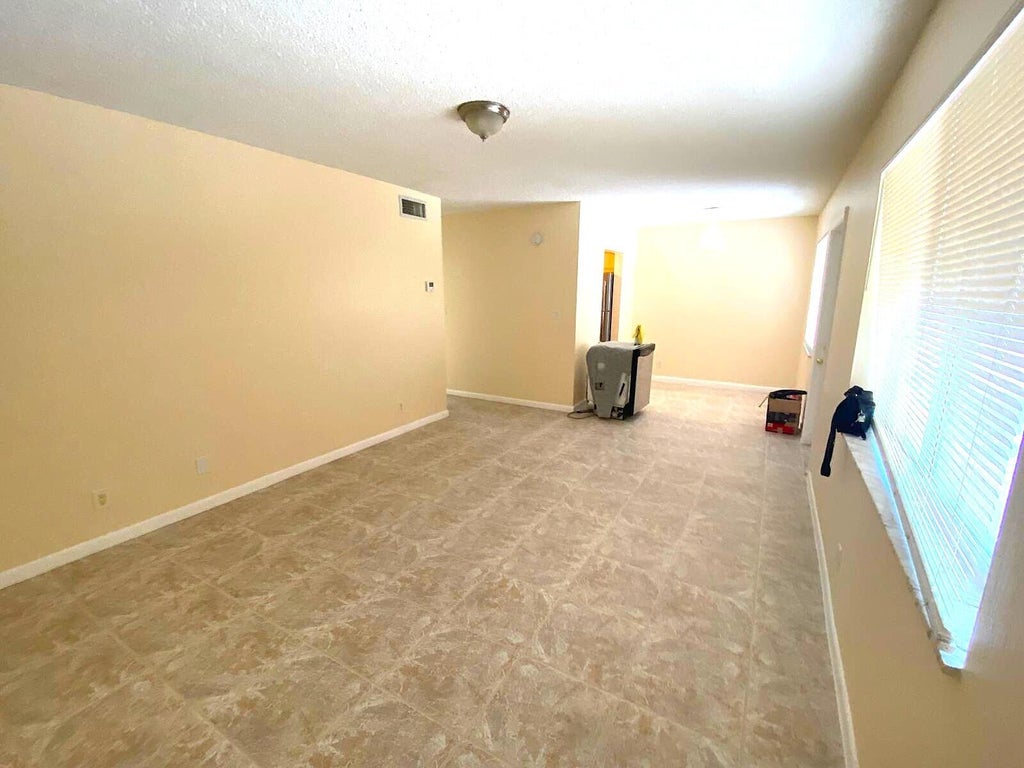Photo of 1020 CRYSTAL LAKE Drive #209, Deerfield Beach, FL 33064 (MLS # B26073330)