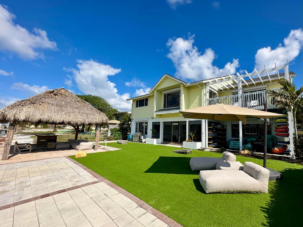 Photo of 2405 Lake Drive 1 Drive, Riviera Beach, FL 33404 (MLS # R11061515)