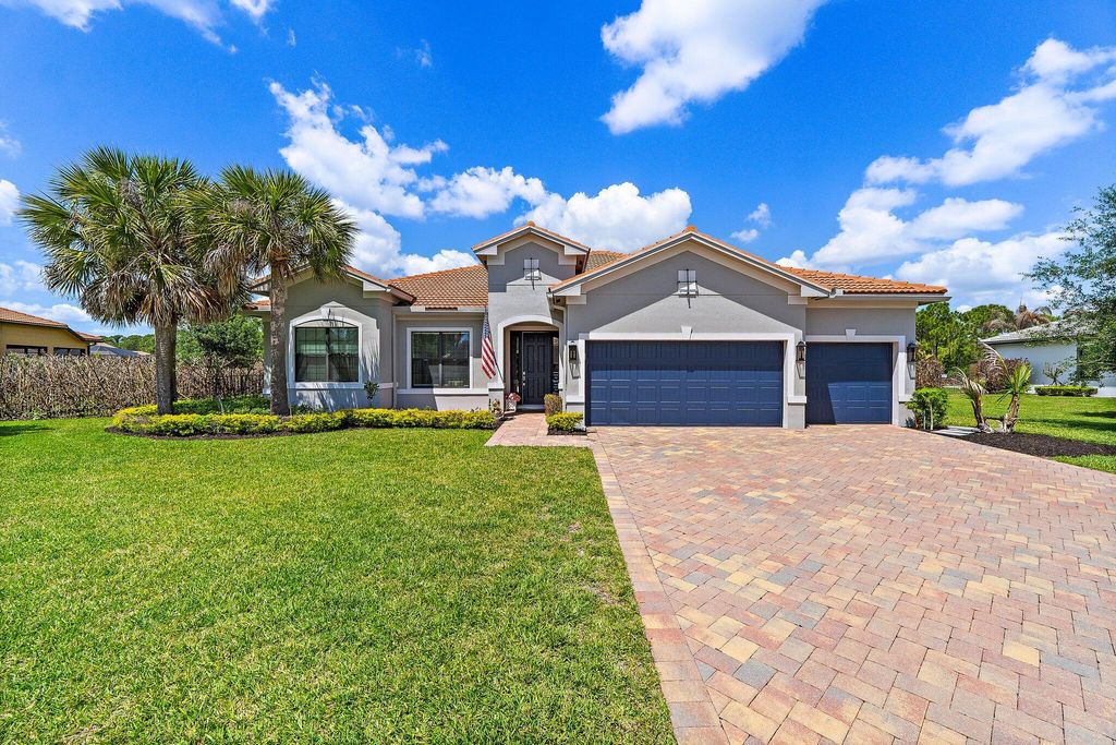 Photo of 940 SW Canoe Creek Terrace, Palm City, FL 34990 (MLS # B26020239)