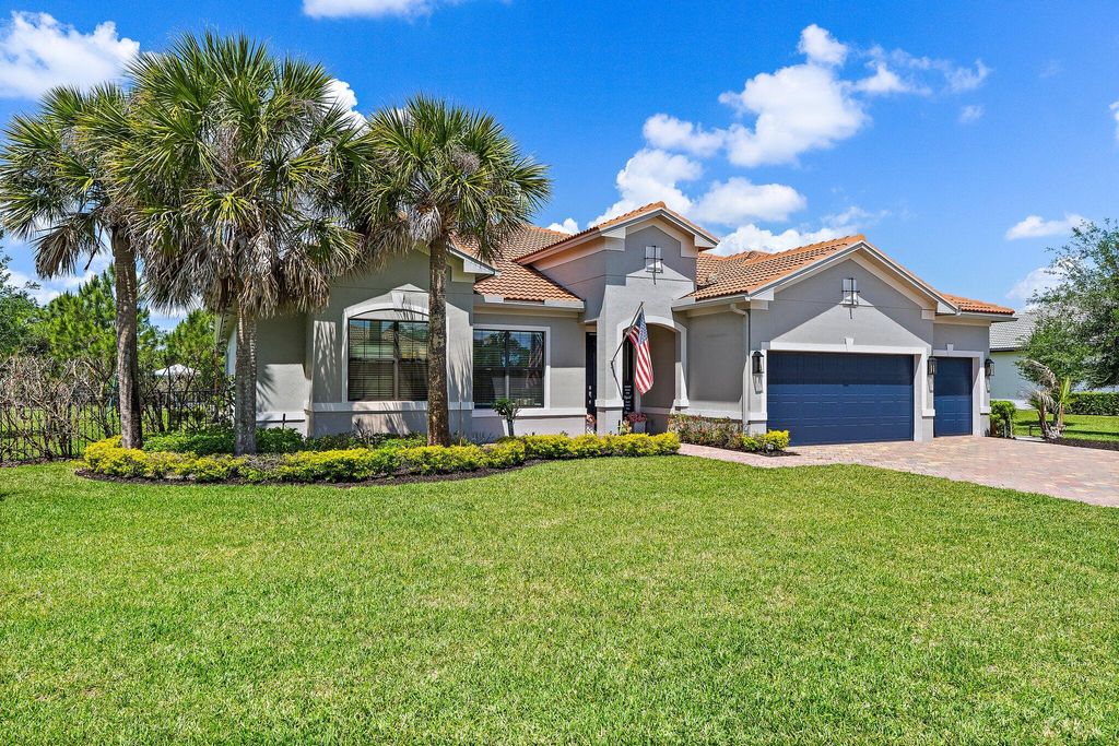 Photo of 940 SW Canoe Creek Terrace, Palm City, FL 34990 (MLS # B26020239)