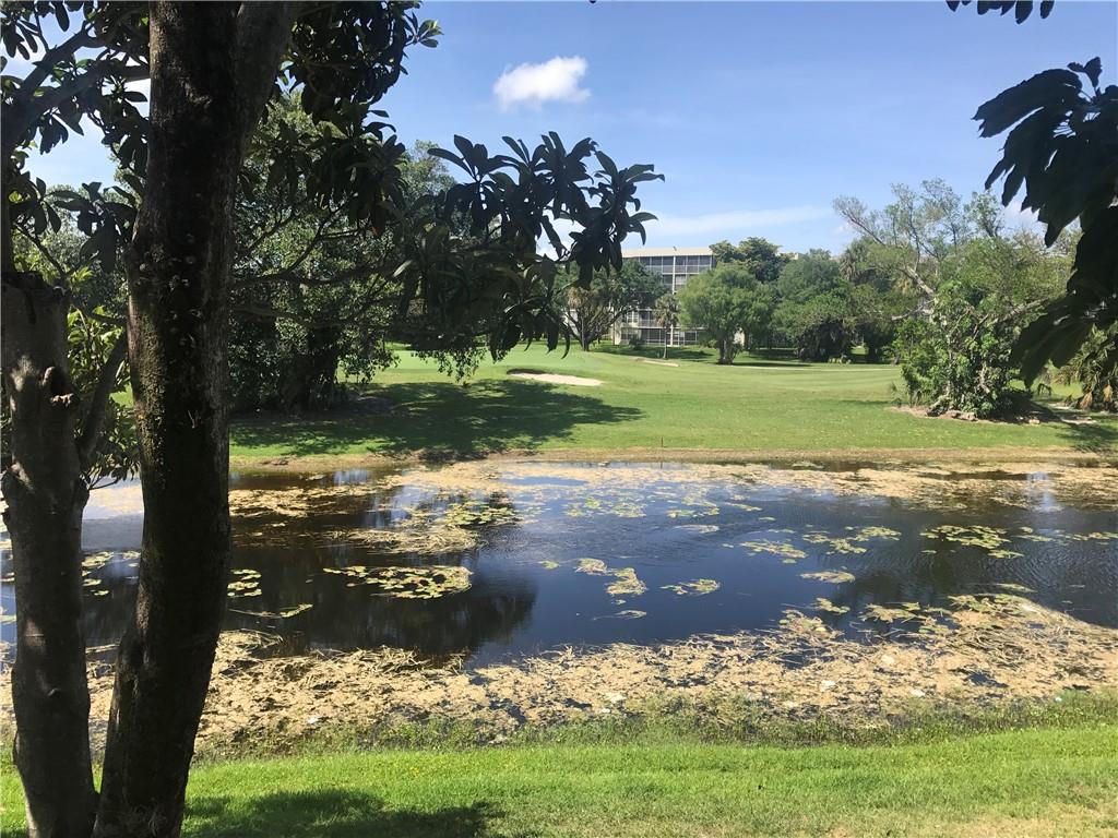 Gorgeous Lake and golf views from the balcony of this updated 2/2 in gated neighborhood. Updated kitchen, tile flooring throughout, WASHER & DRYER IN UNIT, walk in master closet. No elevator second floor entry. Community pool, gym, tennis courts, 24 hour security patrol. Available July 15. Max 2 pets allowed 40lb each. Min credit score 600. Easy to show, fast approval, and will not last.