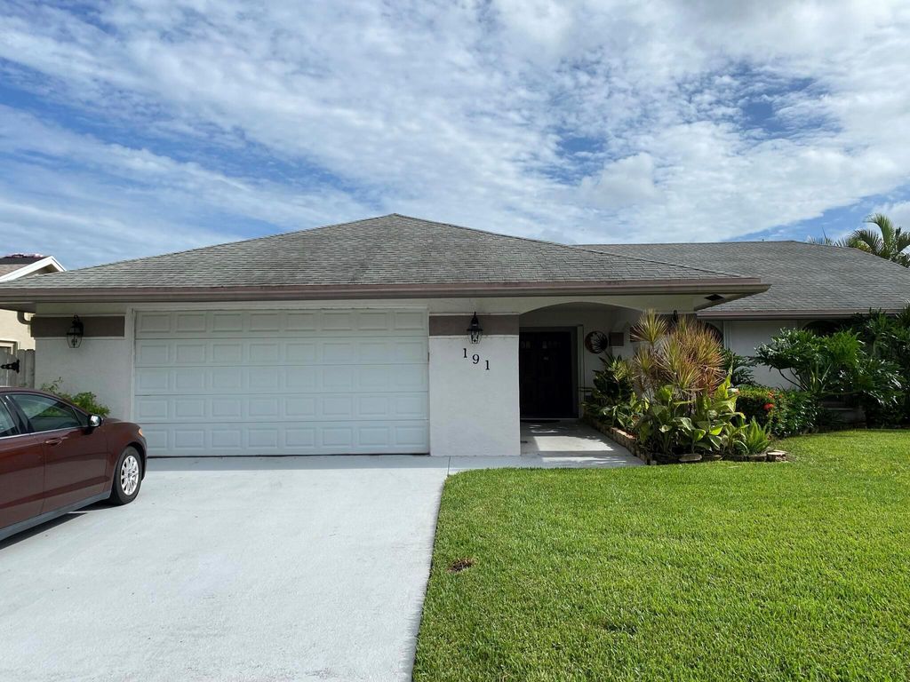 Photo of 191 Parkwood Drive, Royal Palm Beach, FL 33411 (MLS # R10895341)