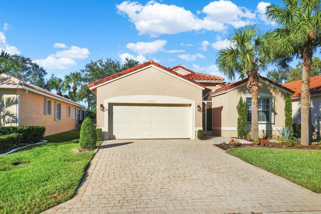 Photo of 318 NW Toscane Trail, Port Saint Lucie, FL 34986 (MLS # R11042994)