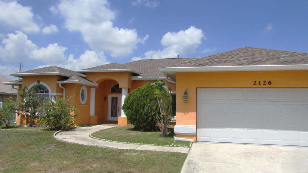 Photo of 2126 SW Gailwood Street, Port Saint Lucie, FL 34987 (MLS # B26048039)