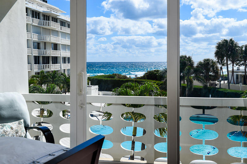 Direct ocean views from every room of this rare 3/3 renovated condo. Corner unit provides wonderful sunny SE exposure. Upgrades include hurricane impact sliders, open kitchen, electric solar blinds and newly redone lobby, garage and more. Washer/Dryer in unit. The Sun & Surf offers direct oceanfront, 24 hour Concierge and valet with pools, spa and fitness center and private beach access.Located in the center of town, steps from restaurants, shopping and bike trail.