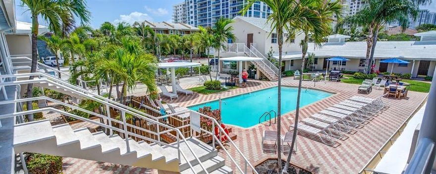 7 blocks from Pompano fishing pier, boardwalk, & restaurants~ STEPS to the sand & sparkling blue Atlantic Ocean. THIS IS PARADISE! Updated and charming 32 room operating hotel~Prime location on Ocean Blvd in Pompano Beach. Courtyard is set back from road, making large pool & deck area extremely comfortable~ Pride of ownership shows! Certified wildlife habitat/butterfly garden with over 80 species of plants~ Rooms are well designed with all new mattresses and upgraded linens. Great flow and feel- must see!