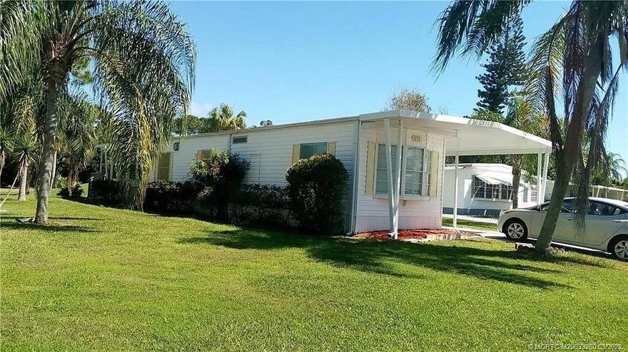 This two bedroom two bath manufactured home in a 55 and older community is a beautiful well maintained manufactured home in a cozy cul-de-sac also on the golf course and view also golf course view directly across from community pool tennis and clubhouse. This house also has a private wooden deck which has a nice open-air breeze overlooking golf course good place to sit outside and barbecue .This home is equipped with new kitchen new water heater new lamps countertops new toilets upgraded bathroom window dressing freshly painted Air  conditioner is only 8 years old roof has been inspected and there was no damages Market rent (new owner): $1,027.59 a month for 12 months.