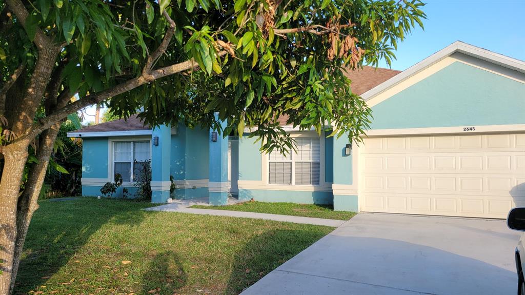 Large spacious home with 3 bedrooms and a den (that can be used as a 4th bedroom). The primary bedroom has two separate bedrooms for each spouse or significant other. Updated kitchen, separate living room, dining room and family room. Lots of room for everyone. The home also offers a screened in patio, a beautiful backyard with fruit trees.Lawn care is included with the monthly rental amount.Located just off of Gatlin Blvd, this home is close to Tradition, and St. Lucie West and is just minutes from I-95, and the Turnpike.