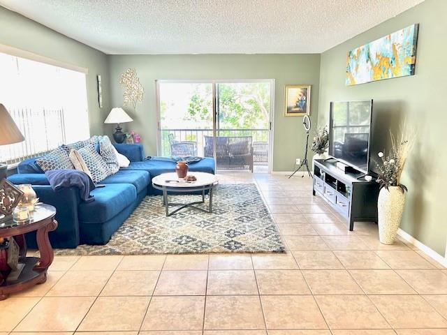 Welcome to the Falls of Inverrary! Turn key!! Beautiful corner unit located on the 3rd floor with a balcony facing water views. This is a spacious two bedroom, two bath. Both bathrooms has been recently remodeled and new A/C. Tile flooring throughout the apartment. Freshly painted interior. Open floor plan brings in lots of natural lighting.
