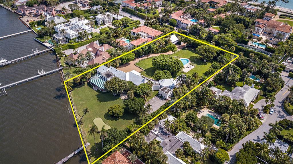 The ONLY opportunity available in Palm Beach for purchase at this time, expanding 2 acres across the intracoastal. Situated along 220 feet of water frontage, this home is comprised of 5-bedrooms and 8.2 bathrooms, plus a detached guest house. Located in the Estate Section, just a short distance from Worth Avenue, this property offers convenience to town along with complete privacy due to the size of the estate. An entertainer's dream complete with indoor and outdoor entertaining spaces, formal dining room, bar area, oversized family/media room, poolside gazebo cabana, putting green, and so much more. Amongst the many special features, this property is situated just South of Everglades Island, which gives expansive water views and sunsets to the West.