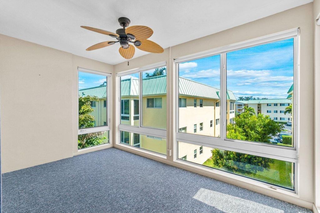 Photo of 21 Colonial Club Drive #305, Boynton Beach, FL 33435 (MLS # R10925915)