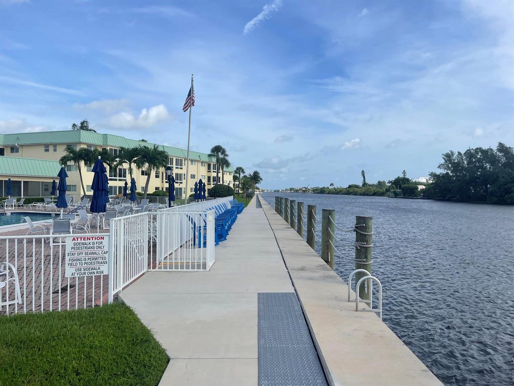 Photo of 21 Colonial Club Drive #305, Boynton Beach, FL 33435 (MLS # R10925915)