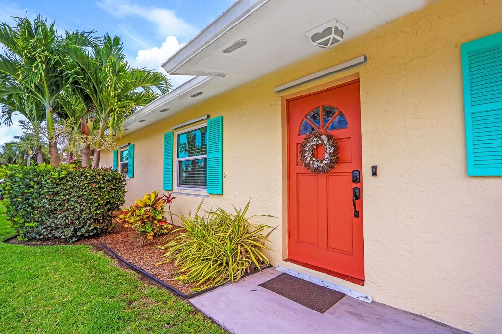 Photo of 1110 NE Crescent Street, Jensen Beach, FL 34957 (MLS # R10902450)