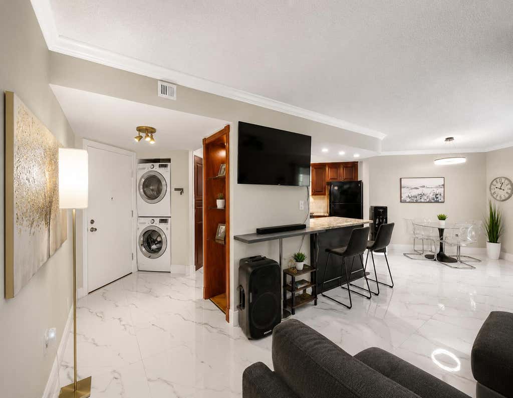 Photo of 6855 W Broward Boulevard #201, Plantation, FL 33317 (MLS # B26066711)