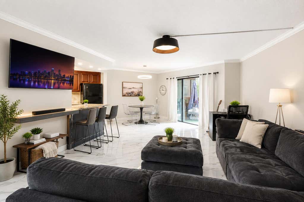 Photo of 6855 W Broward Boulevard #201, Plantation, FL 33317 (MLS # B26066711)