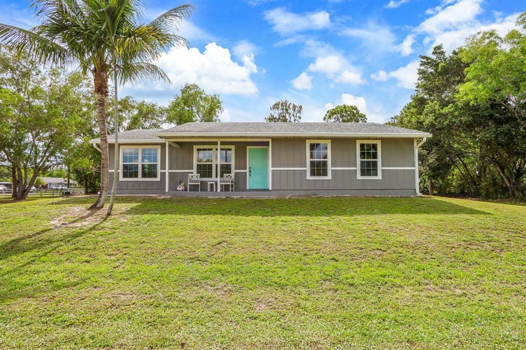 Photo of 13037 63rd Lane N, West Palm Beach, FL 33412 (MLS # R10888444)