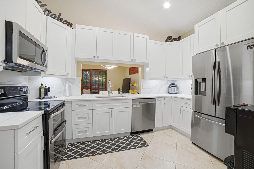 Photo of 7625 Forest Green Lane, Boynton Beach, FL 33436 (MLS # B26014612)