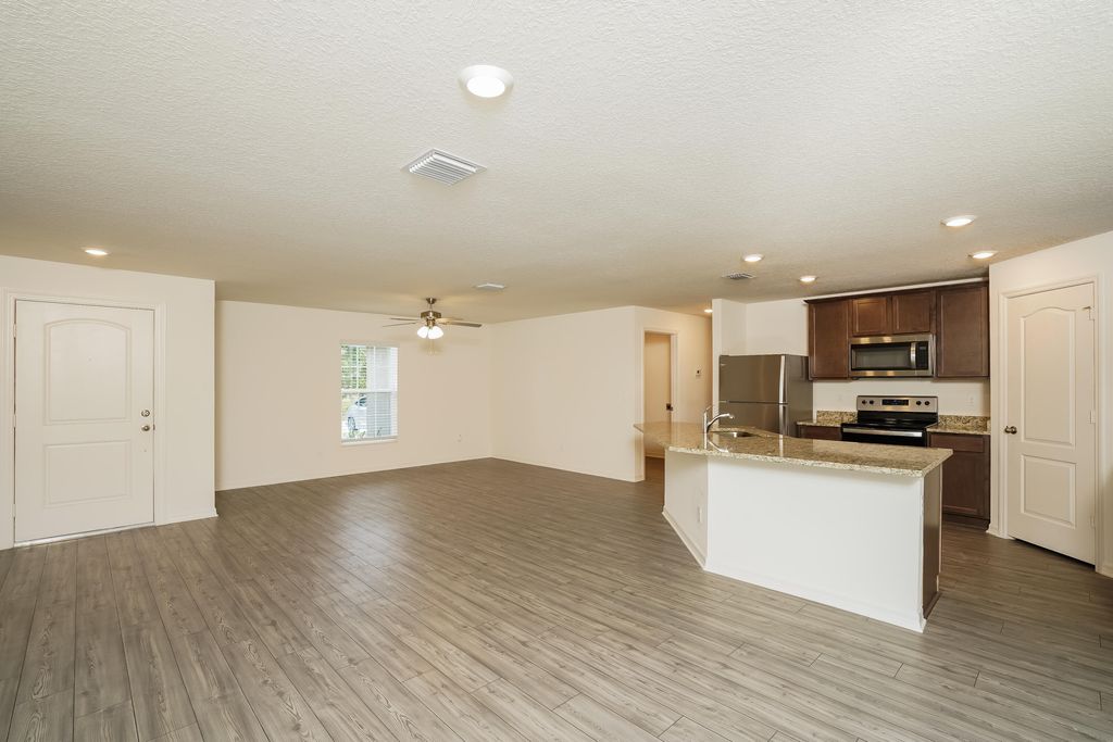 Photo of 2174 SW Wayne Street, Port Saint Lucie, FL 34984 (MLS # B26012055)