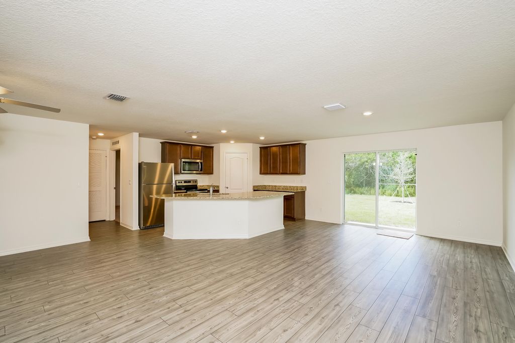 Photo of 2174 SW Wayne Street, Port Saint Lucie, FL 34984 (MLS # B26012055)