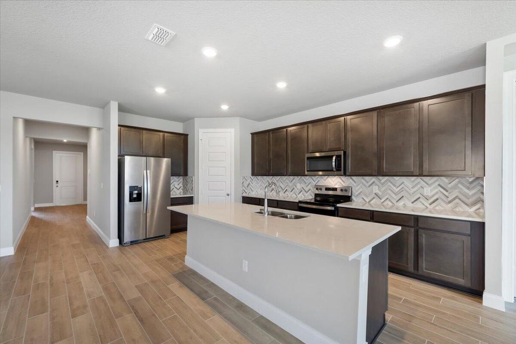 Photo of 6504 NW Cloverdale Avenue, Port Saint Lucie, FL 34987 (MLS # R11011118)