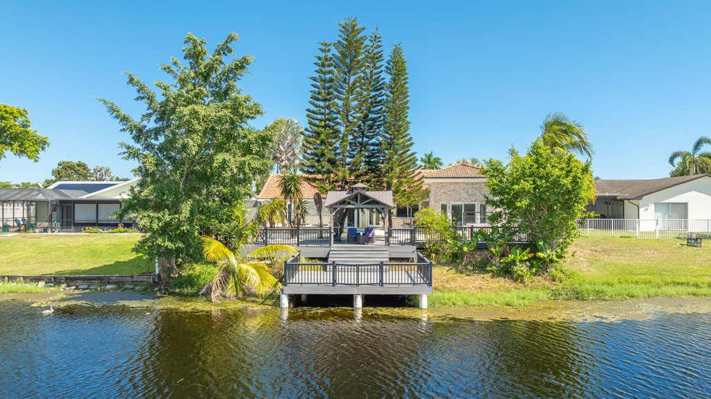 Photo of 2557 SW 14TH Court, Deerfield Beach, FL 33442 (MLS # B26067129)